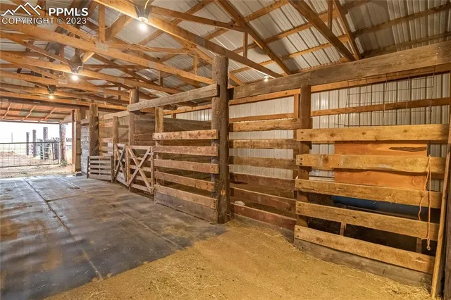 a view of an empty room with storage