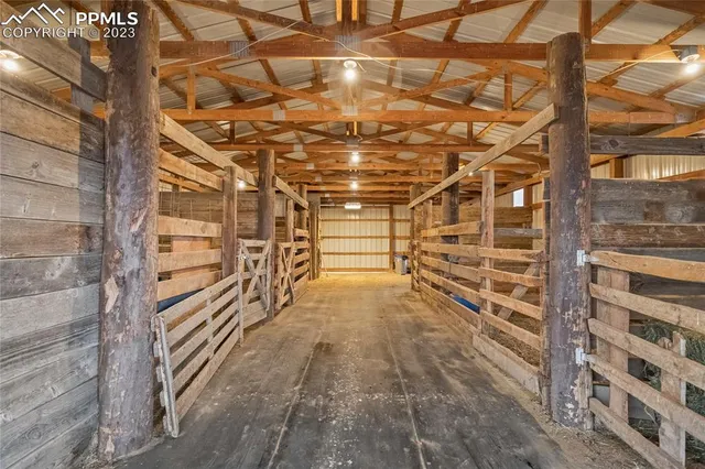 a view of an empty room with a windows