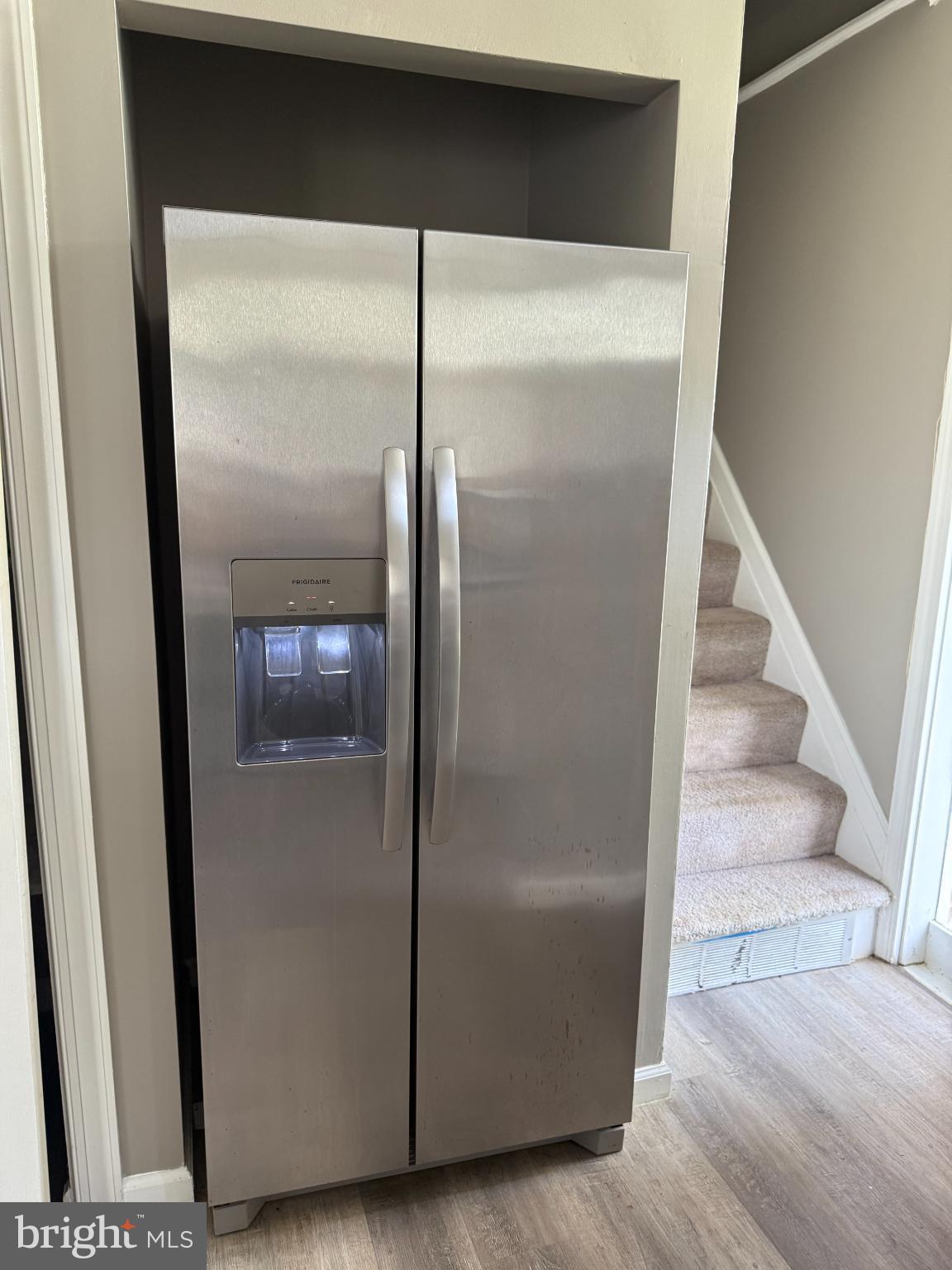 913 Spa Road Annapolis, MD 21401 - Photo 4 of 16 Sleek stainless steel fridge in modern home.