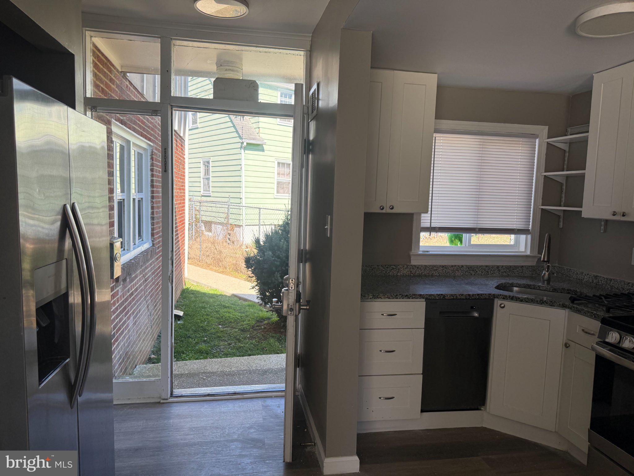 913 Spa Road Annapolis, MD 21401 - Photo 7 of 16 Bright kitchen with outdoor access.