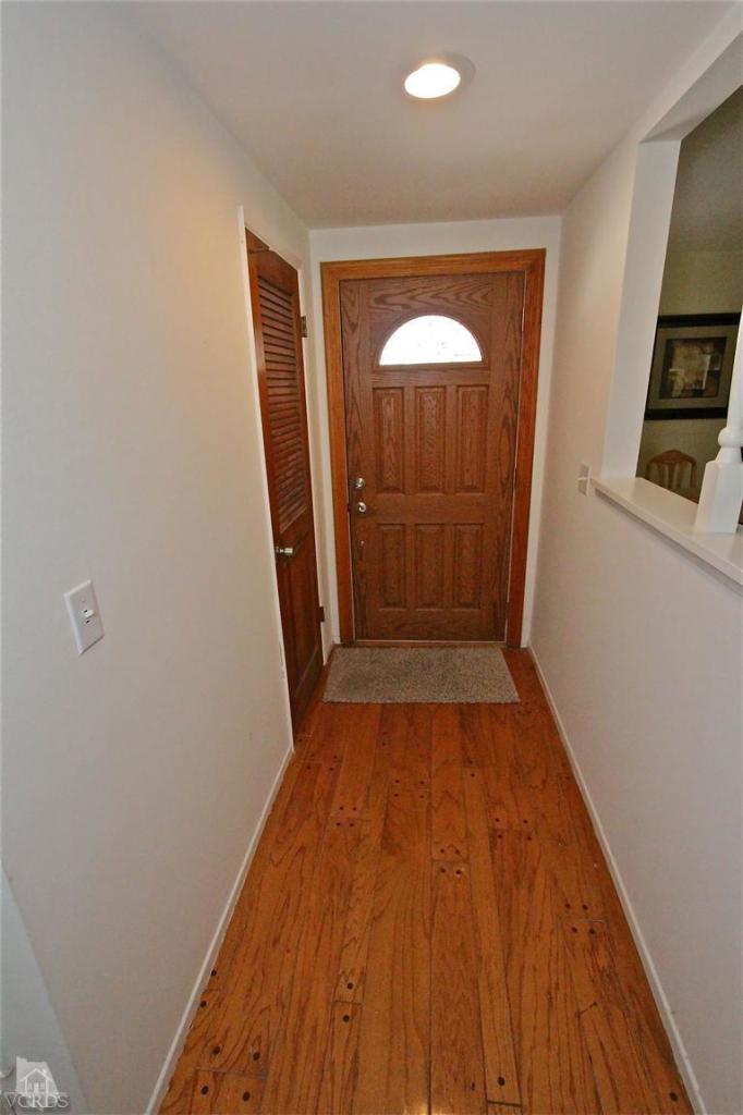 1025 Roldan Avenue Simi Valley, CA 93065 - Photo 3 of 28 a view of a hallway with wooden floor