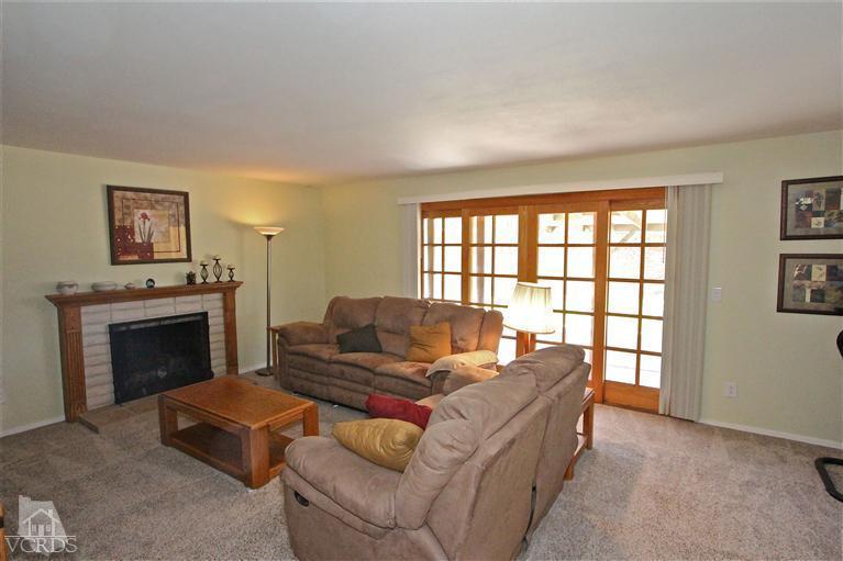 1025 Roldan Avenue Simi Valley, CA 93065 - Photo 8 of 28 a living room with furniture and a fireplace