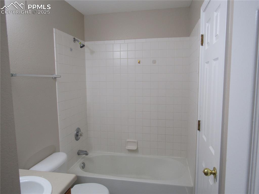 331 Trapper Lane Fountain, CO 80817 - Photo 7 of 10 a bathroom with a bathtub and a shower
