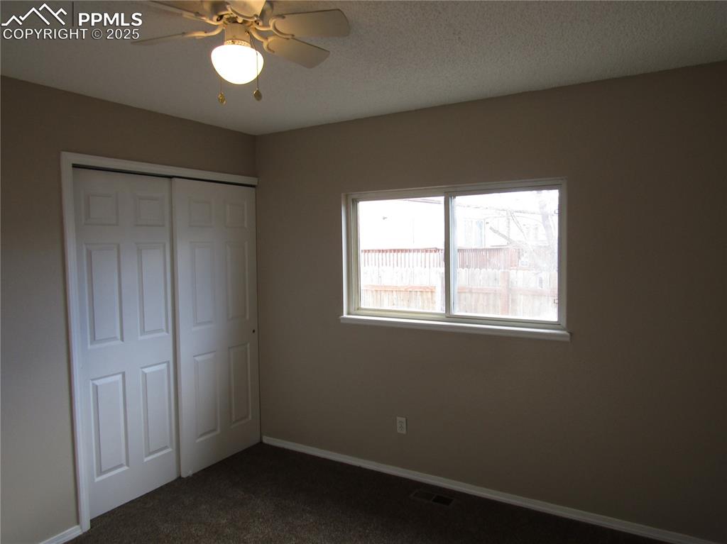 331 Trapper Lane Fountain, CO 80817 - Photo 10 of 10 an empty room with a window