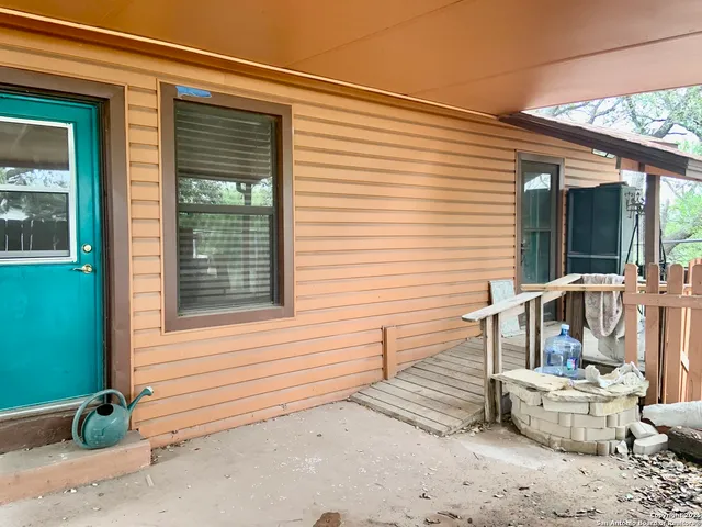a room with furniture and window
