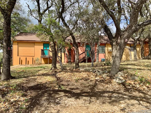 a backyard of a house with trees