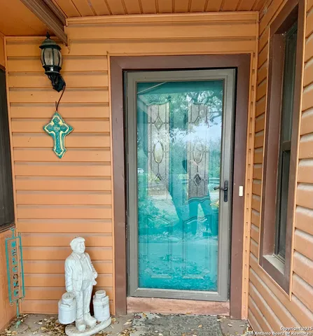 a glass door with a outdoor space