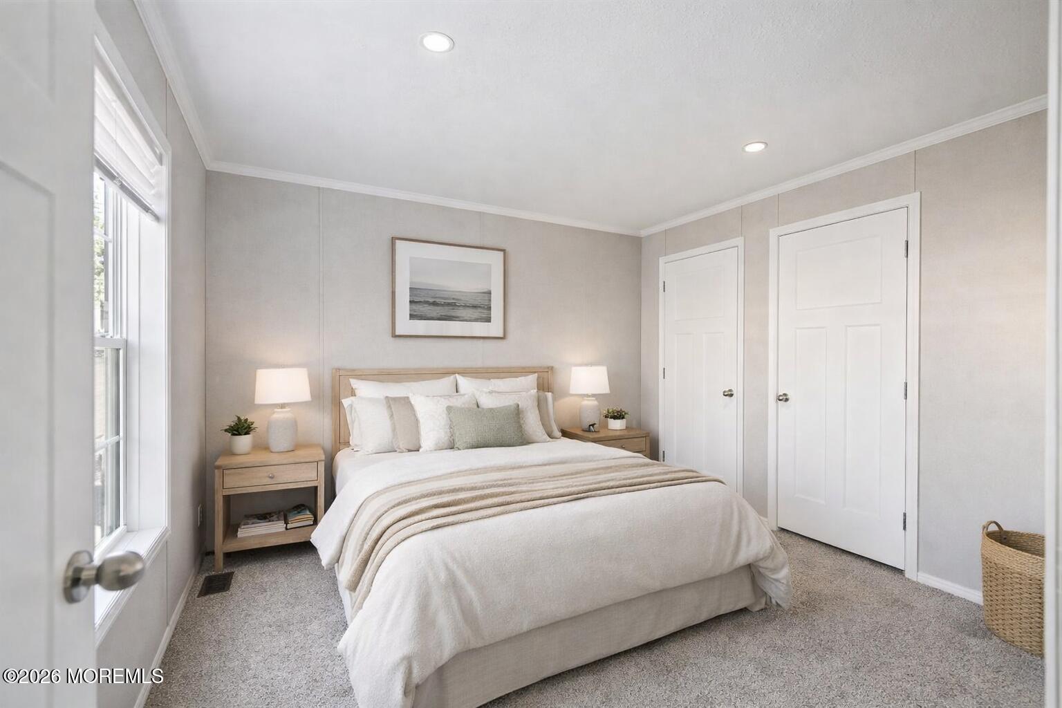 1820 State Rte 35, Unit 16 Wall, NJ 07719 - Photo 14 of 24 a bedroom with a bed and a painting