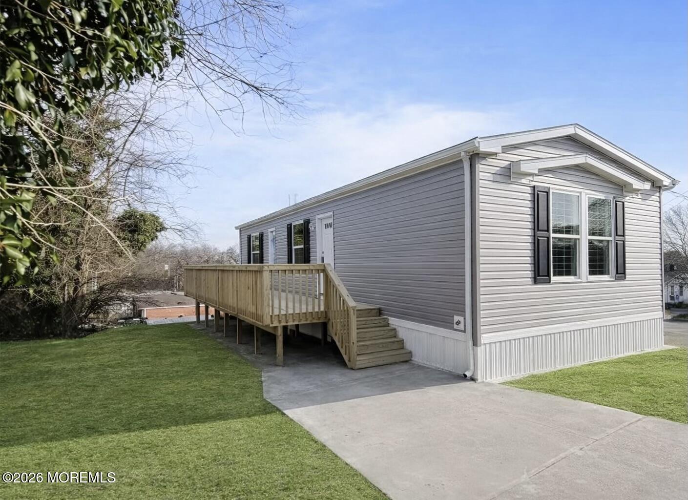 1820 State Rte 35, Unit 16 Wall, NJ 07719 - Photo 2 of 24 a view of a house with a backyard