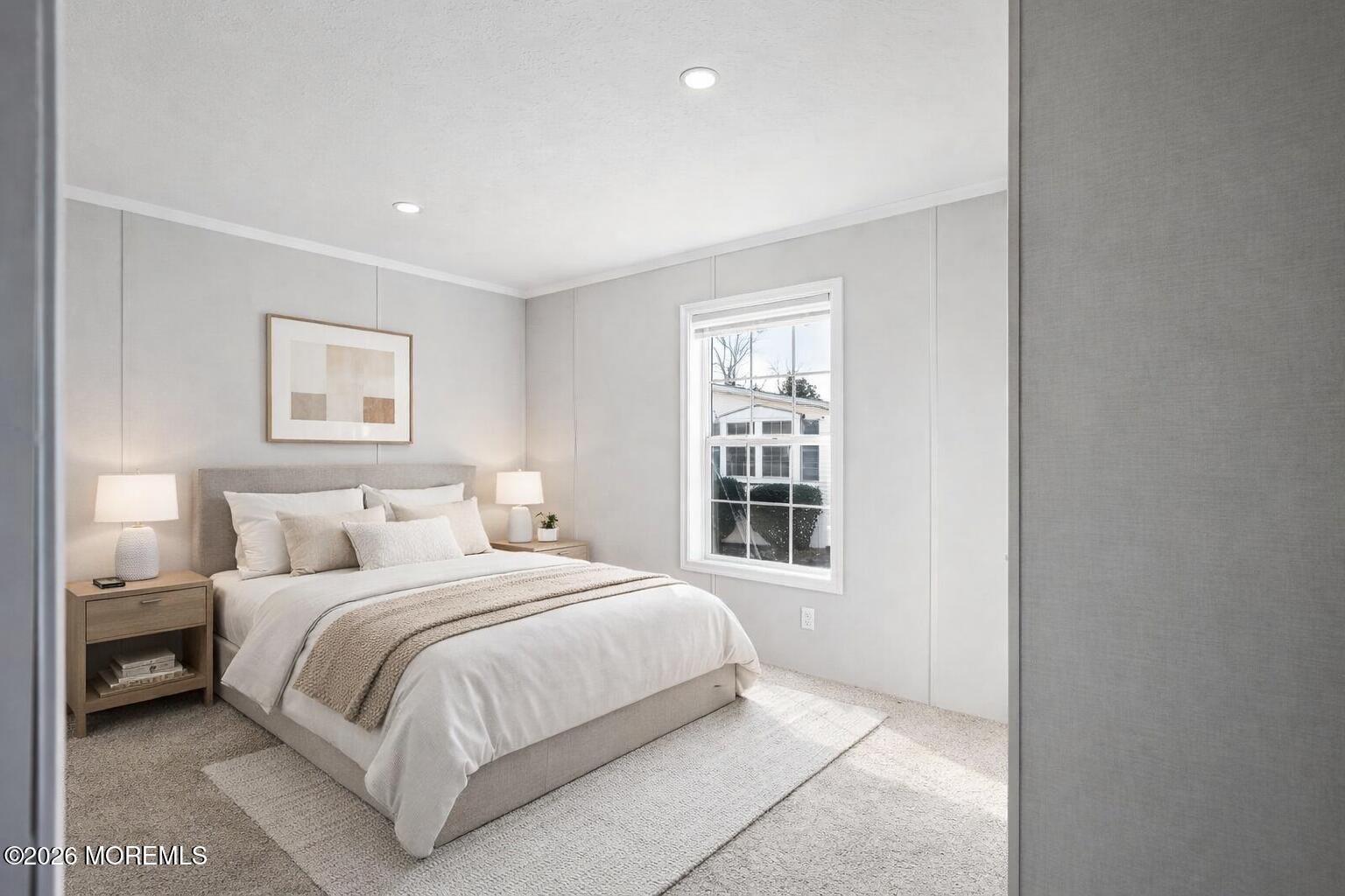 1820 State Rte 35, Unit 16 Wall, NJ 07719 - Photo 21 of 24 a bedroom with a large bed and a window