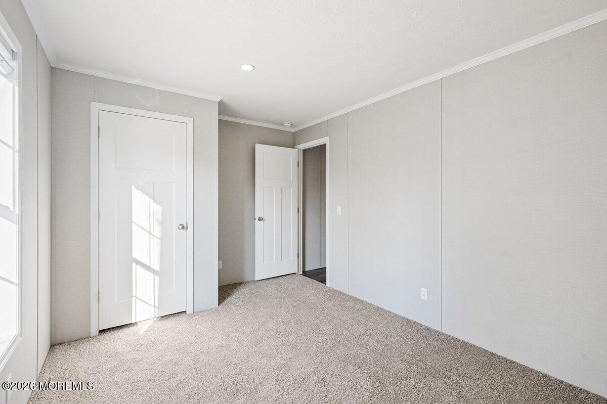 1820 State Rte 35, Unit 16 Wall, NJ 07719 - Photo 22 of 24 a view of an empty room