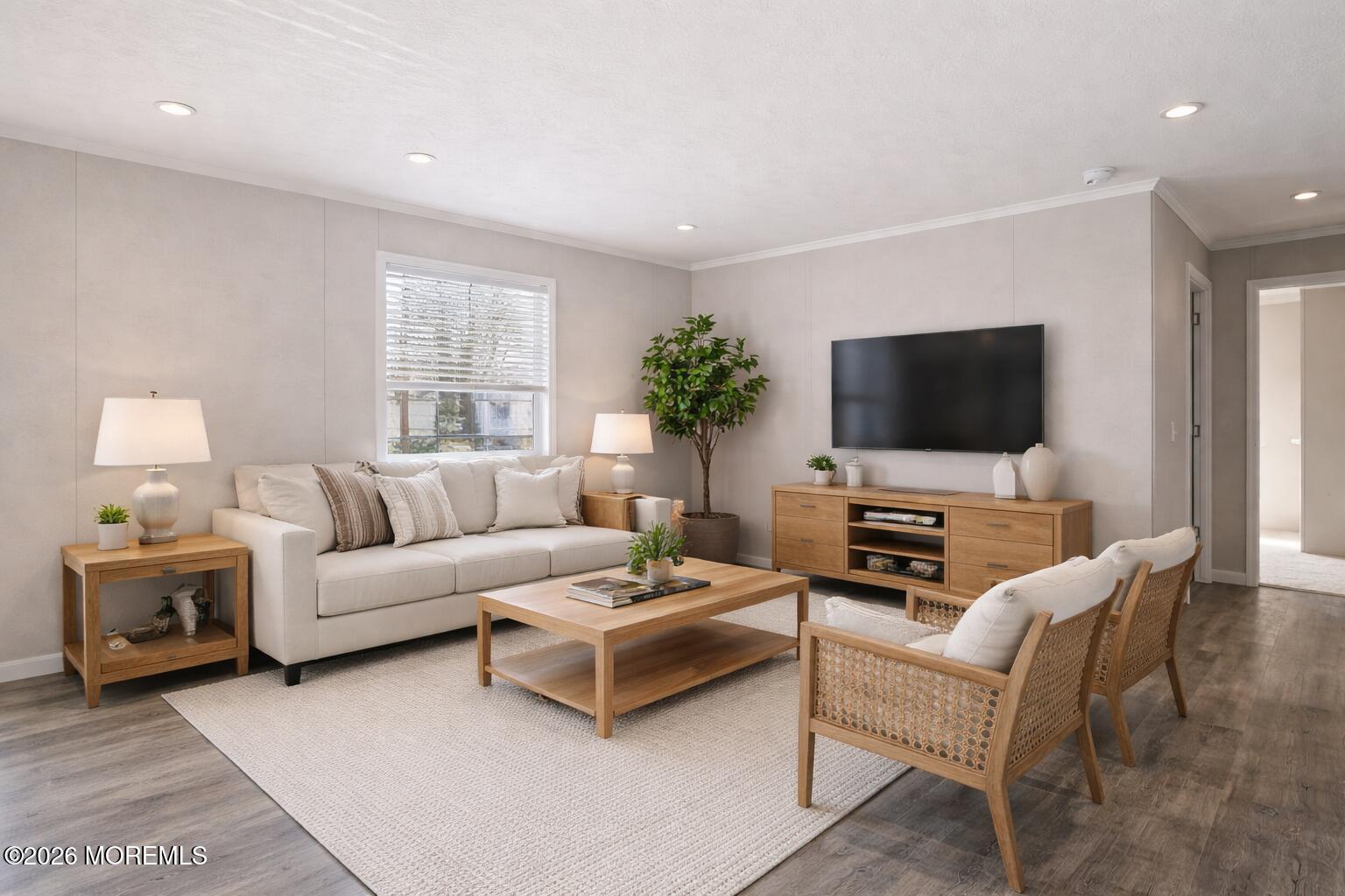1820 State Rte 35, Unit 16 Wall, NJ 07719 - Photo 6 of 24 a living room with furniture and a flat screen tv