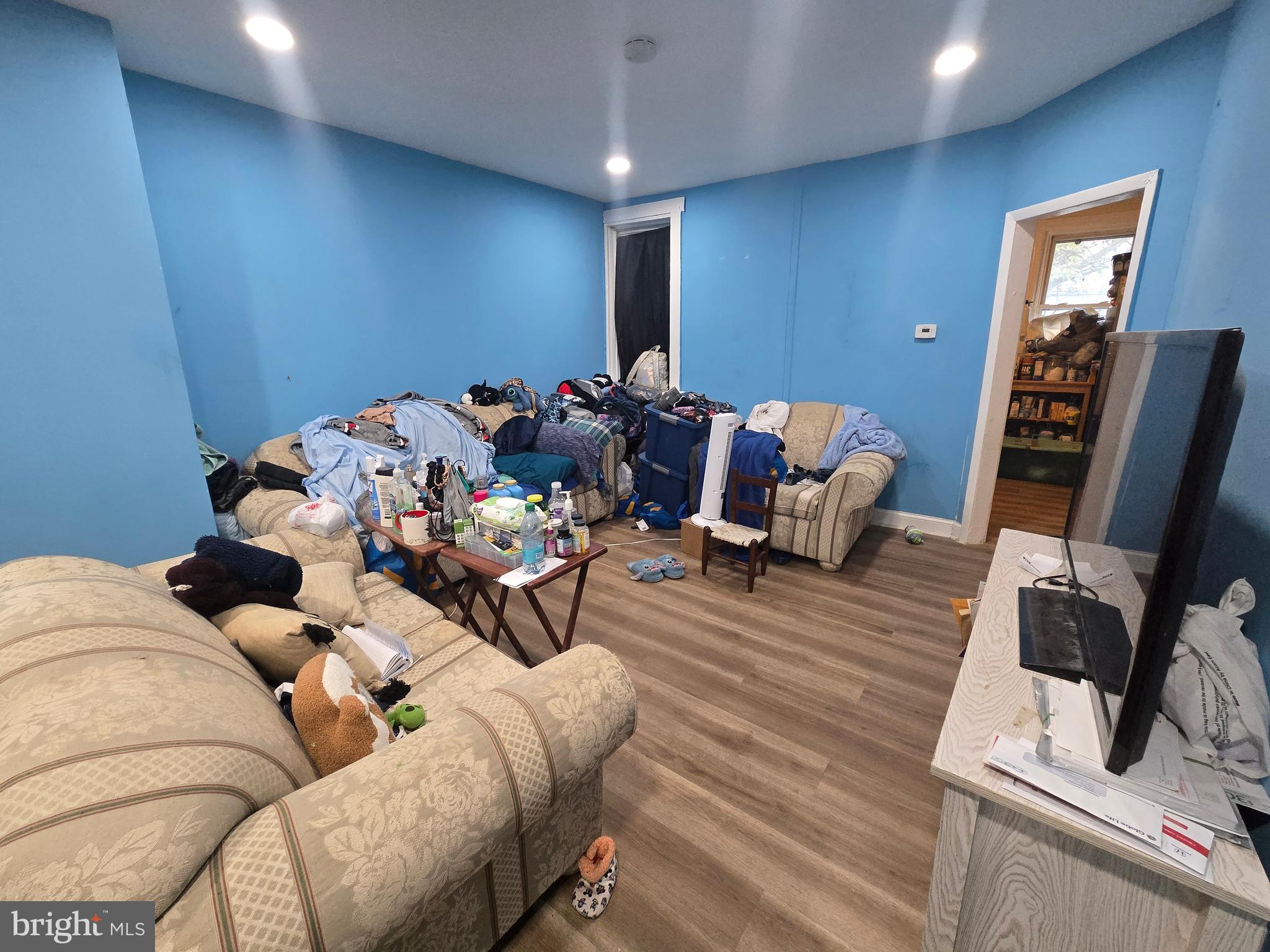 1135 Thomas Street Chester, PA 19013 - Photo 4 of 12 a living room with furniture