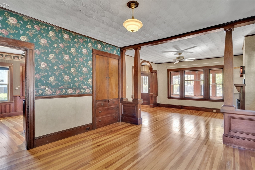 219 Pelham Street Methuen, MA 01844 - Photo 14 of 39 a view of empty room with wooden floor and fan