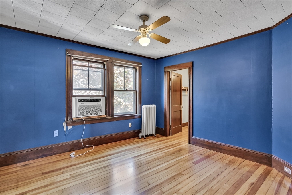 219 Pelham Street Methuen, MA 01844 - Photo 26 of 39 wooden floor and windows in a room