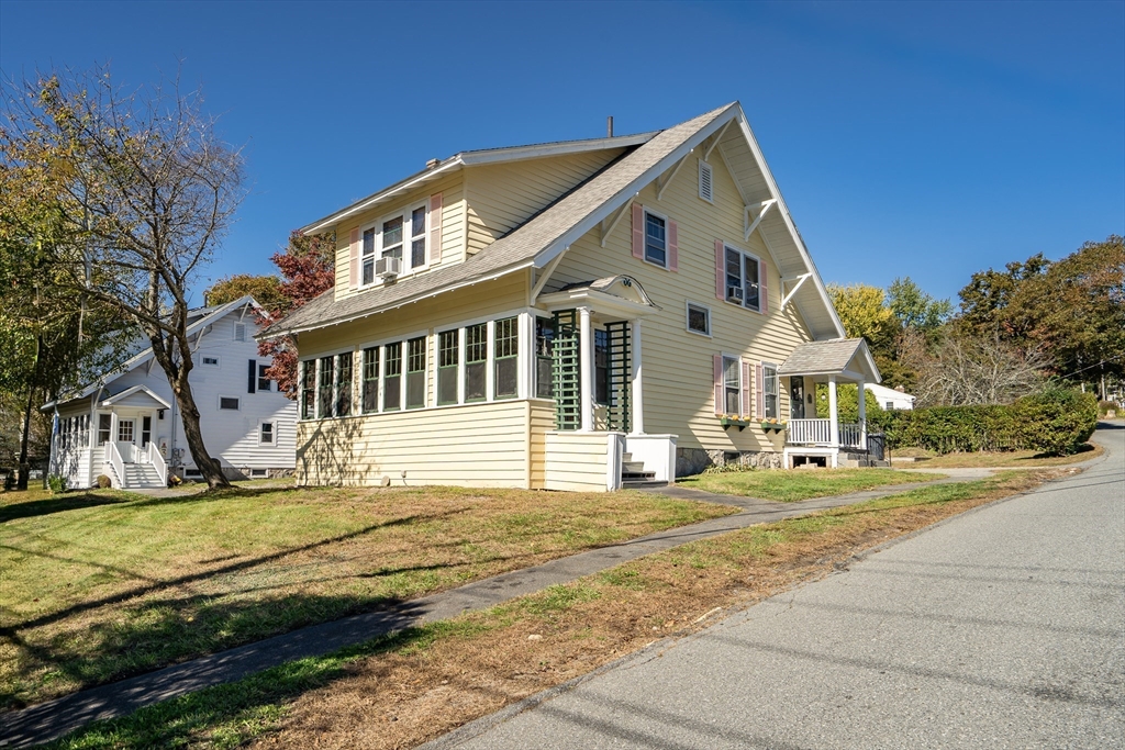 219 Pelham Street Methuen, MA 01844 - Photo 3 of 39 a front view of a house with a yard