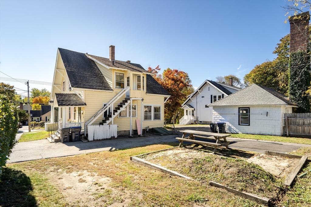 219 Pelham Street Methuen, MA 01844 - Photo 39 of 39 a view of a house with pool and chairs