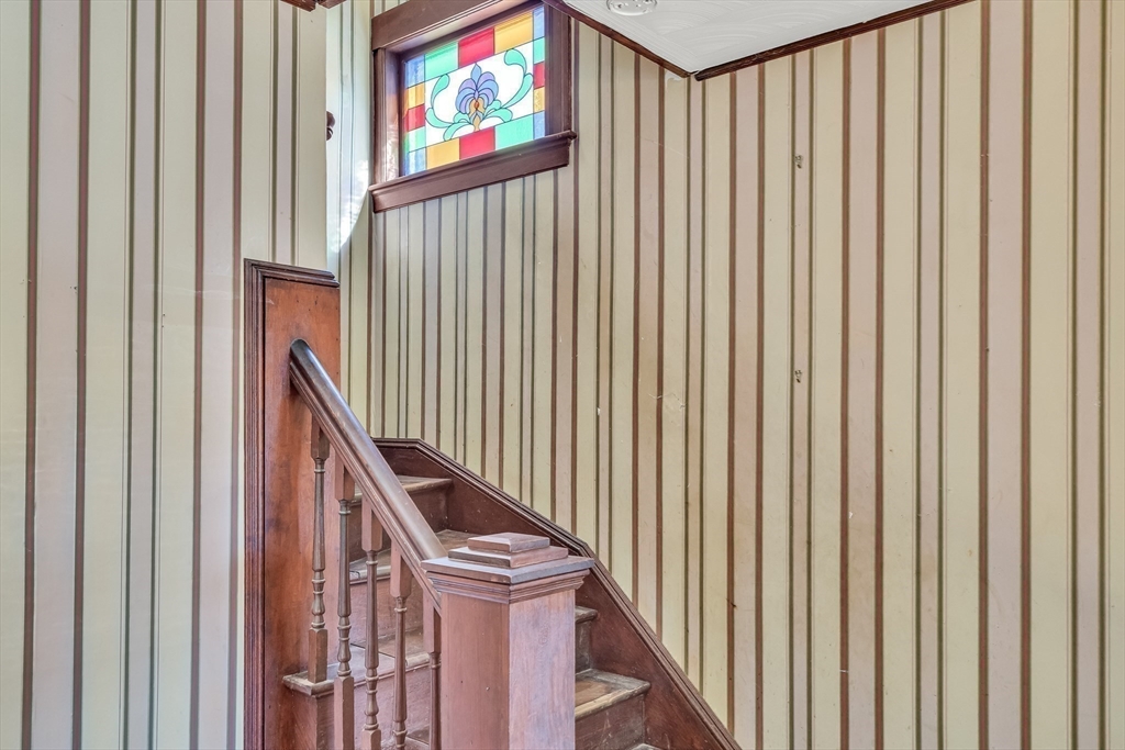 219 Pelham Street Methuen, MA 01844 - Photo 8 of 39 a view of staircase with wooden floor and stairs