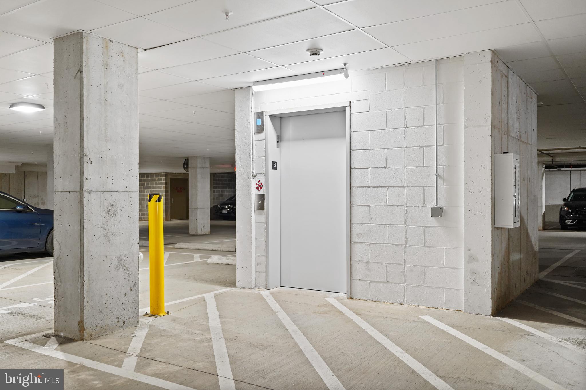 1675 Bandit Loop, Unit 107B Reston, VA 20190 - Photo 30 of 36 a view of a hallway with wooden shelves