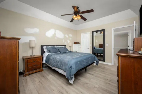 a kitchen with a stove and a refrigerator