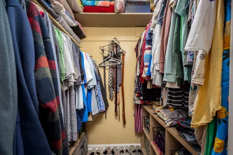 a living room with lots of furniture and a flat screen tv