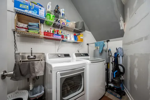 a view of a bike storage and utility room