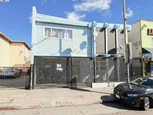 a car parked in front of a house