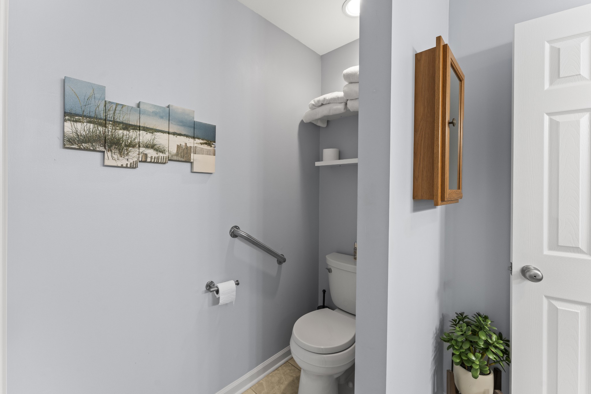6 Chadsworth Place Tullahoma, TN 37388 - Photo 26 of 49 a bathroom with a toilet and a shower curtain
