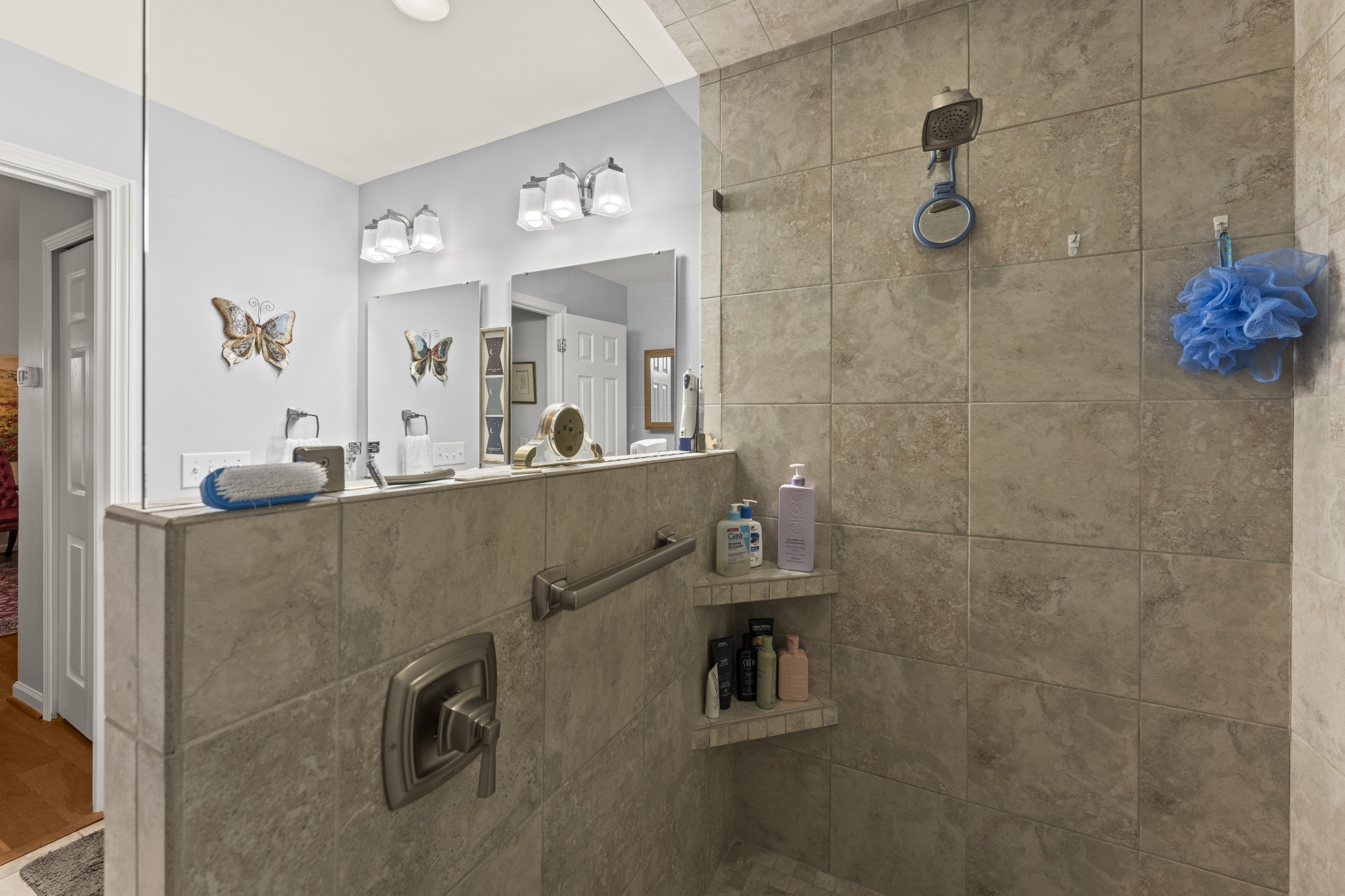 6 Chadsworth Place Tullahoma, TN 37388 - Photo 27 of 49 a room with a mirror and shower