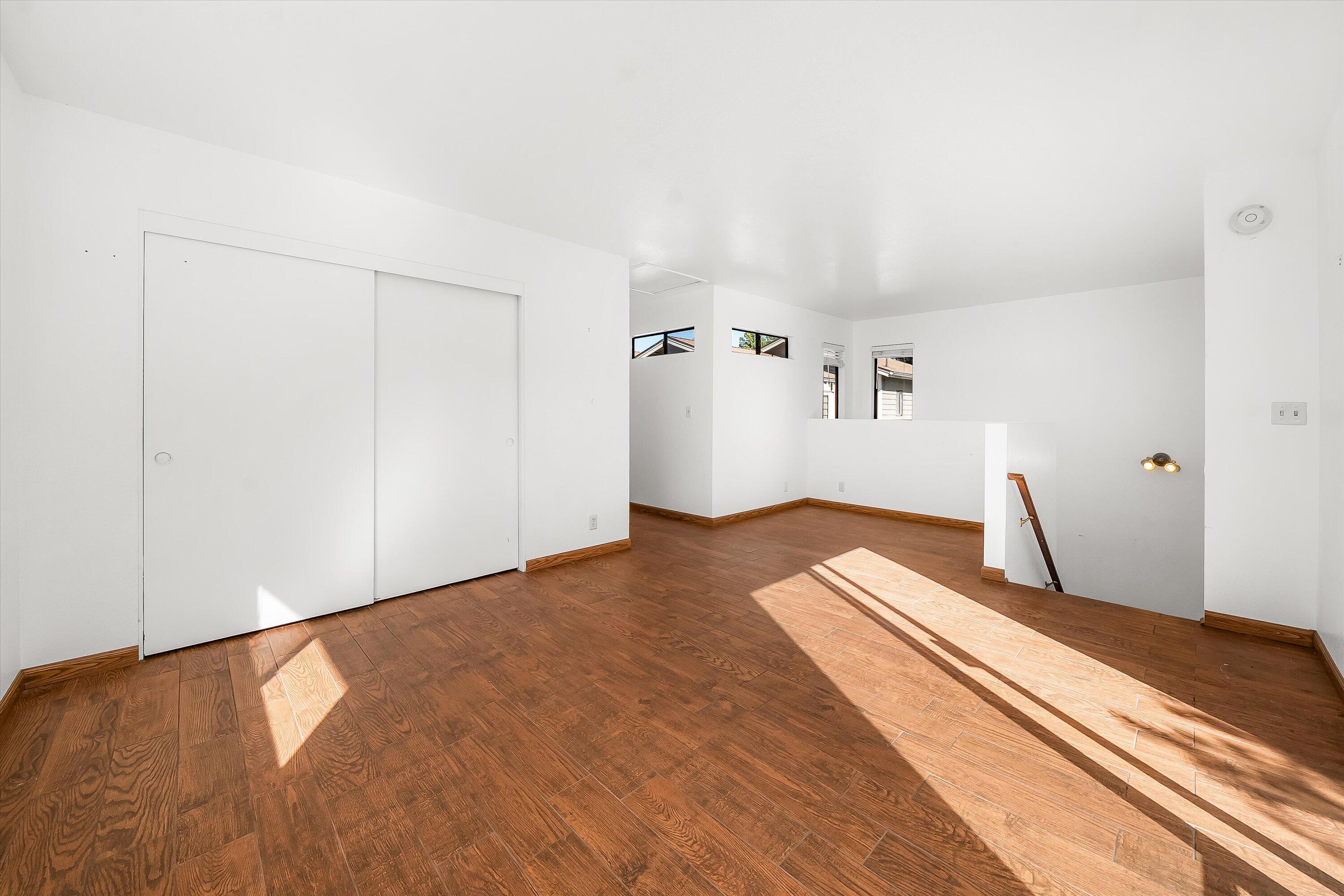 522 West Victoria Street, Unit B Santa Barbara, CA 93101 - Photo 14 of 21 a view of a room with wooden floor
