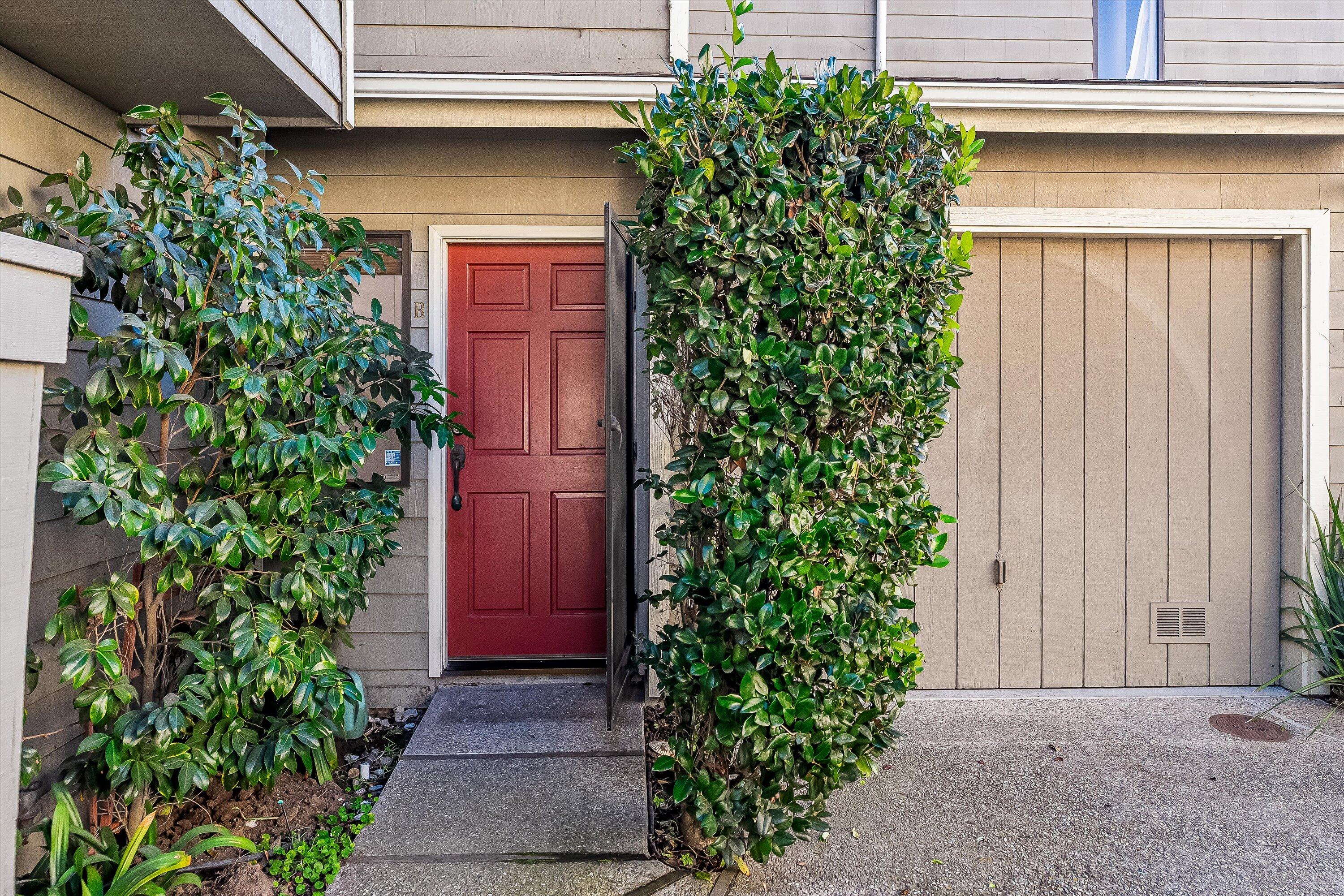522 West Victoria Street, Unit B Santa Barbara, CA 93101 - Photo 2 of 21 a front view of a house with a garden