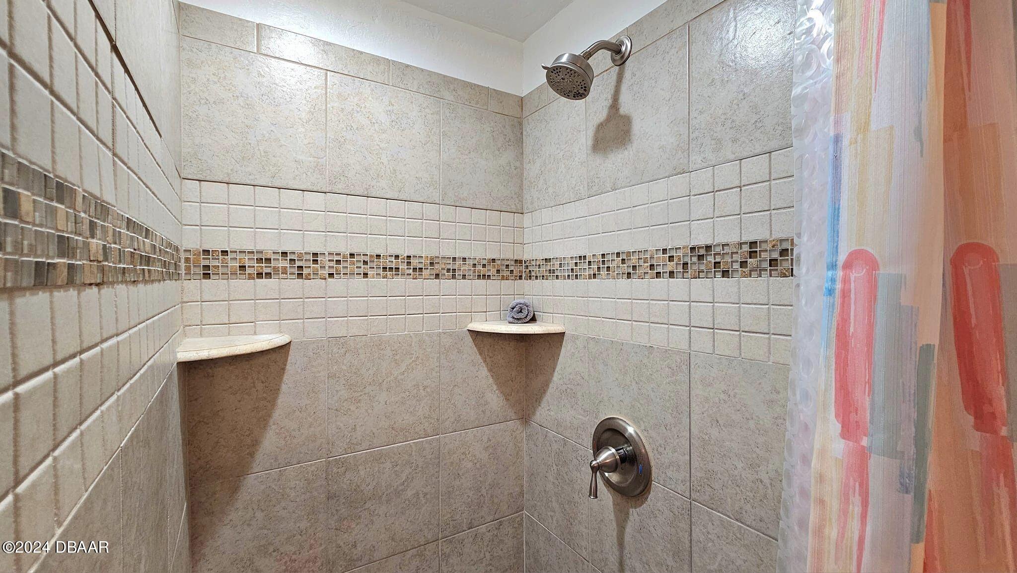 23 Palmetto Drive Ormond Beach, FL 32176 - Photo 28 of 42 custom tiled shower