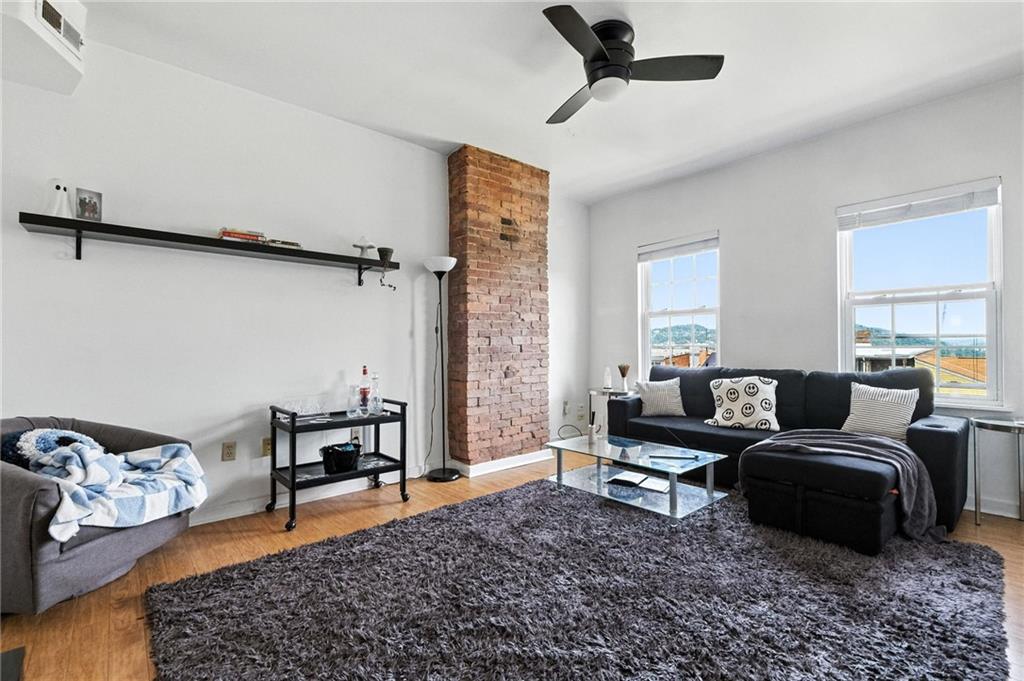 3037 Pulawski Way Pittsburgh, PA 15219 - Photo 6 of 26 a living room with furniture