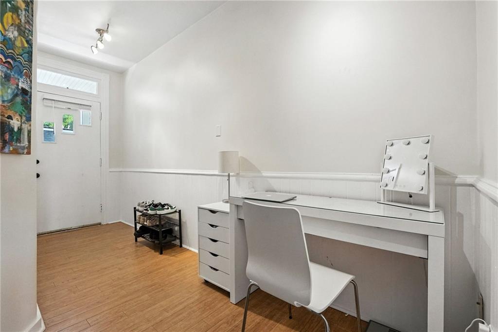 3037 Pulawski Way Pittsburgh, PA 15219 - Photo 10 of 26 a storage room with wooden floor and furniture