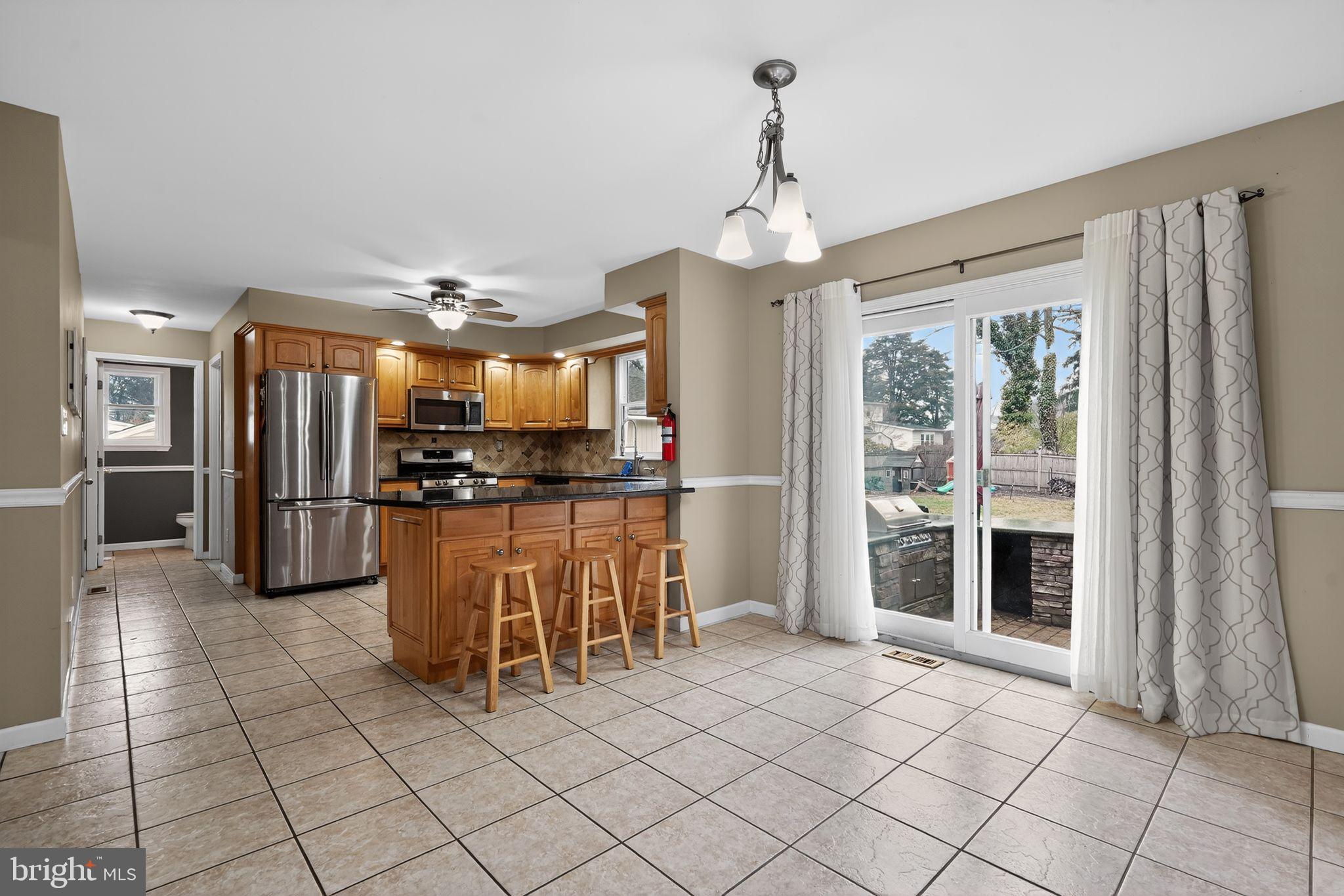 740 Carpenter Street Glassboro, NJ 08028 - Photo 12 of 44 Bright and inviting kitchen with outdoor access.
