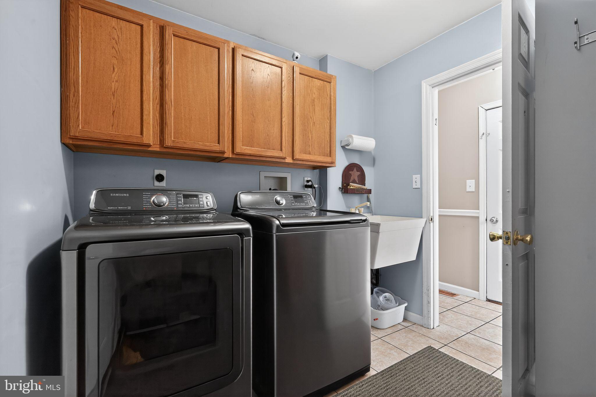 740 Carpenter Street Glassboro, NJ 08028 - Photo 16 of 44 Modern laundry room with ample storage.