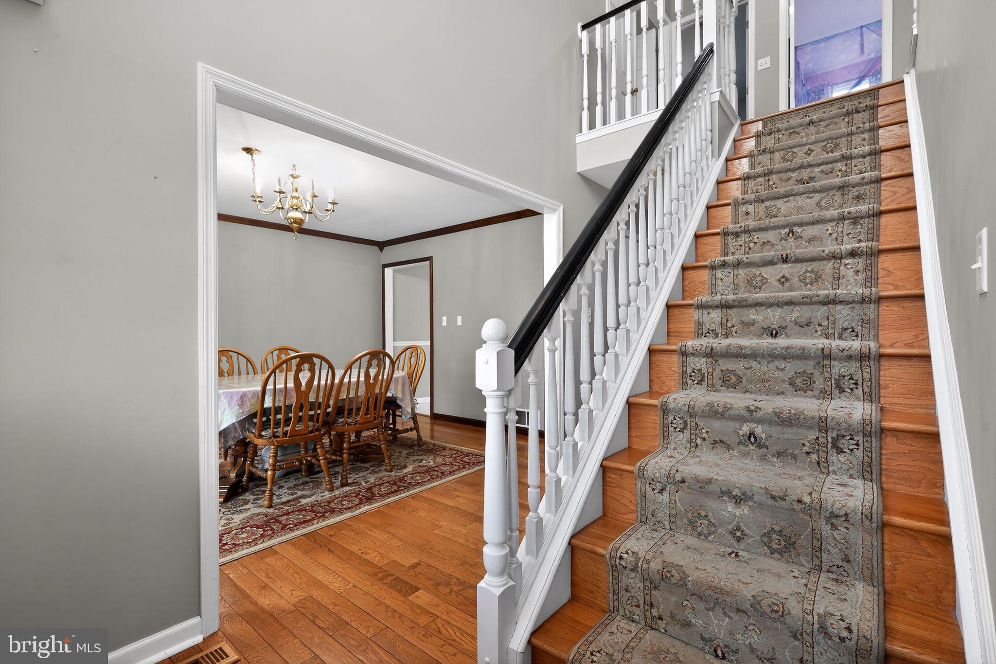 740 Carpenter Street Glassboro, NJ 08028 - Photo 20 of 44 Inviting entryway with elegant staircase.