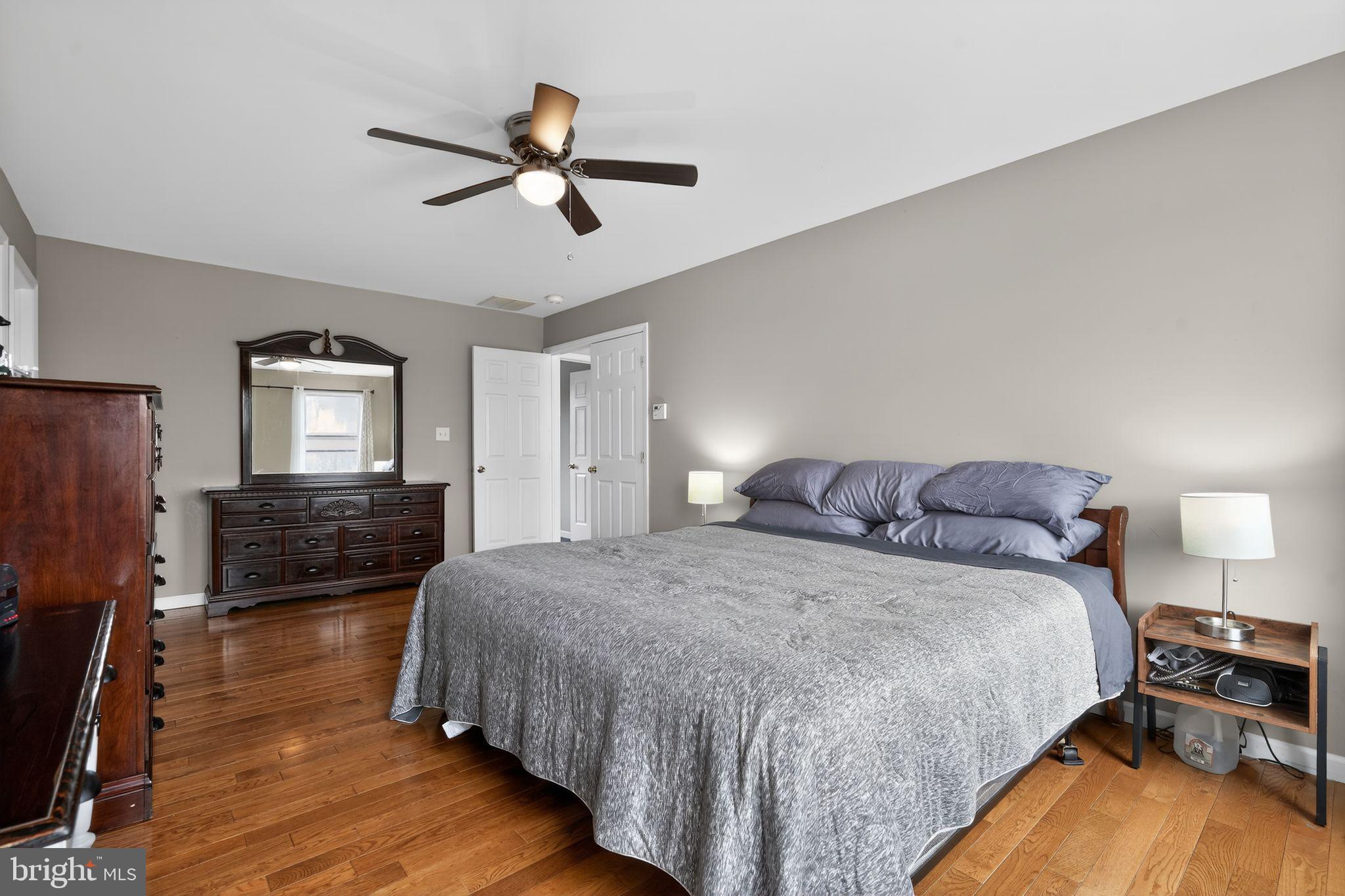 740 Carpenter Street Glassboro, NJ 08028 - Photo 23 of 44 Serene bedroom with warm wooden accents.
