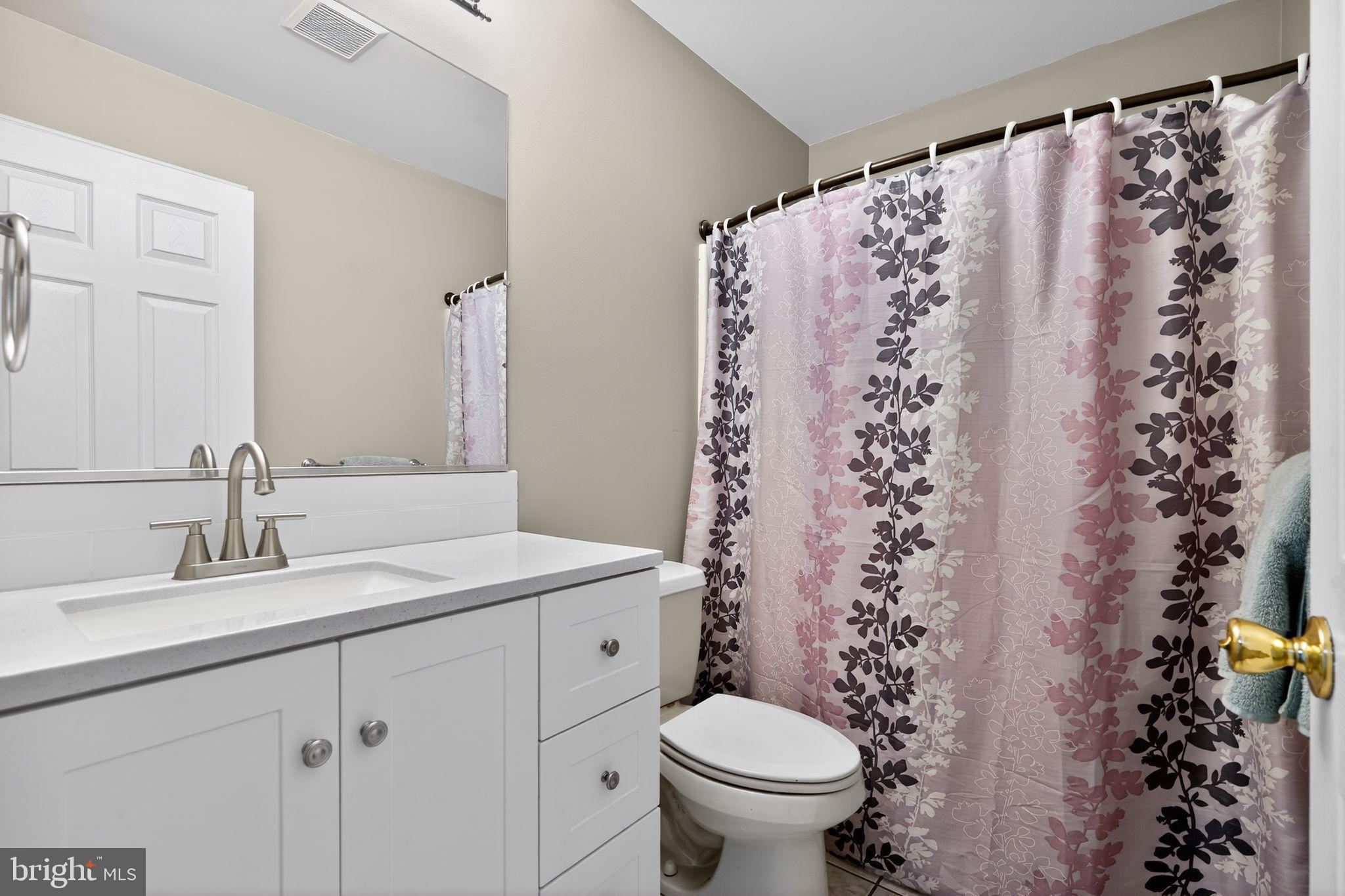 740 Carpenter Street Glassboro, NJ 08028 - Photo 30 of 44 Charming bathroom with floral accents.