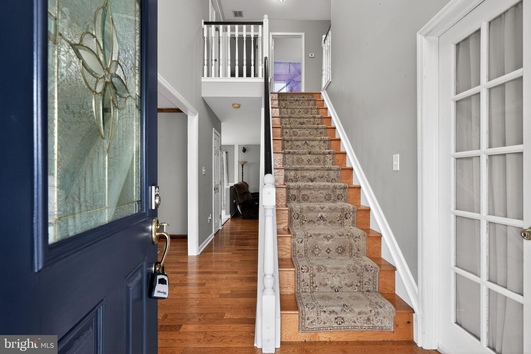 740 Carpenter Street Glassboro, NJ 08028 - Photo 3 of 44 Inviting entryway with elegant staircase.