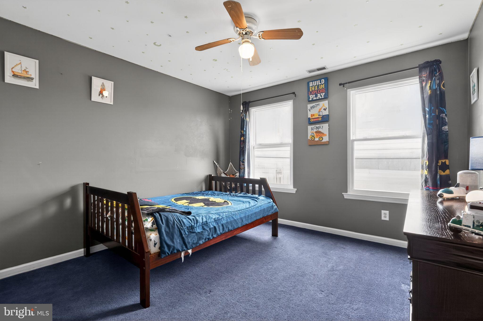 740 Carpenter Street Glassboro, NJ 08028 - Photo 31 of 44 Cozy bedroom with playful decor and light.