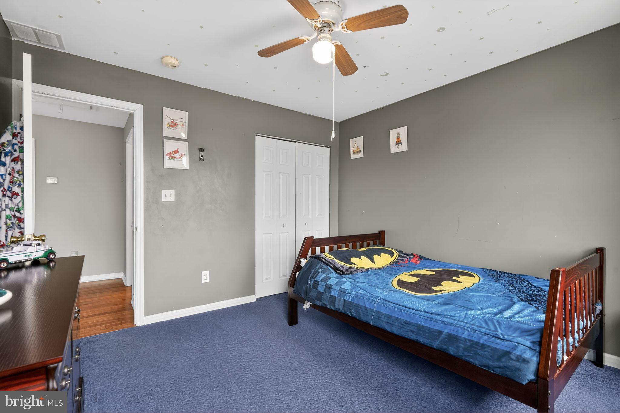 740 Carpenter Street Glassboro, NJ 08028 - Photo 32 of 44 Cozy bedroom with playful Batman theme.