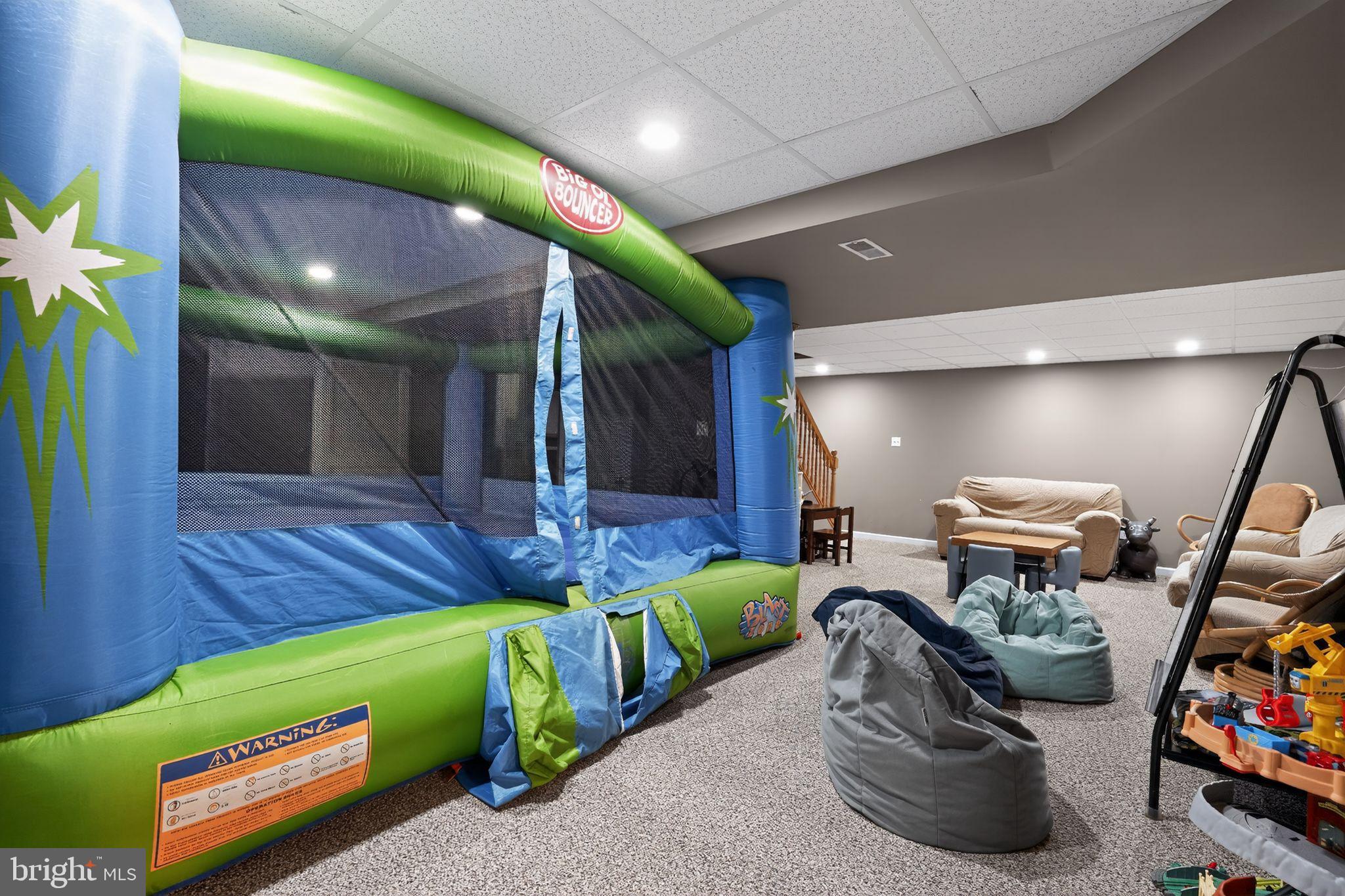 740 Carpenter Street Glassboro, NJ 08028 - Photo 36 of 44 Fun-filled basement with a bounce house!