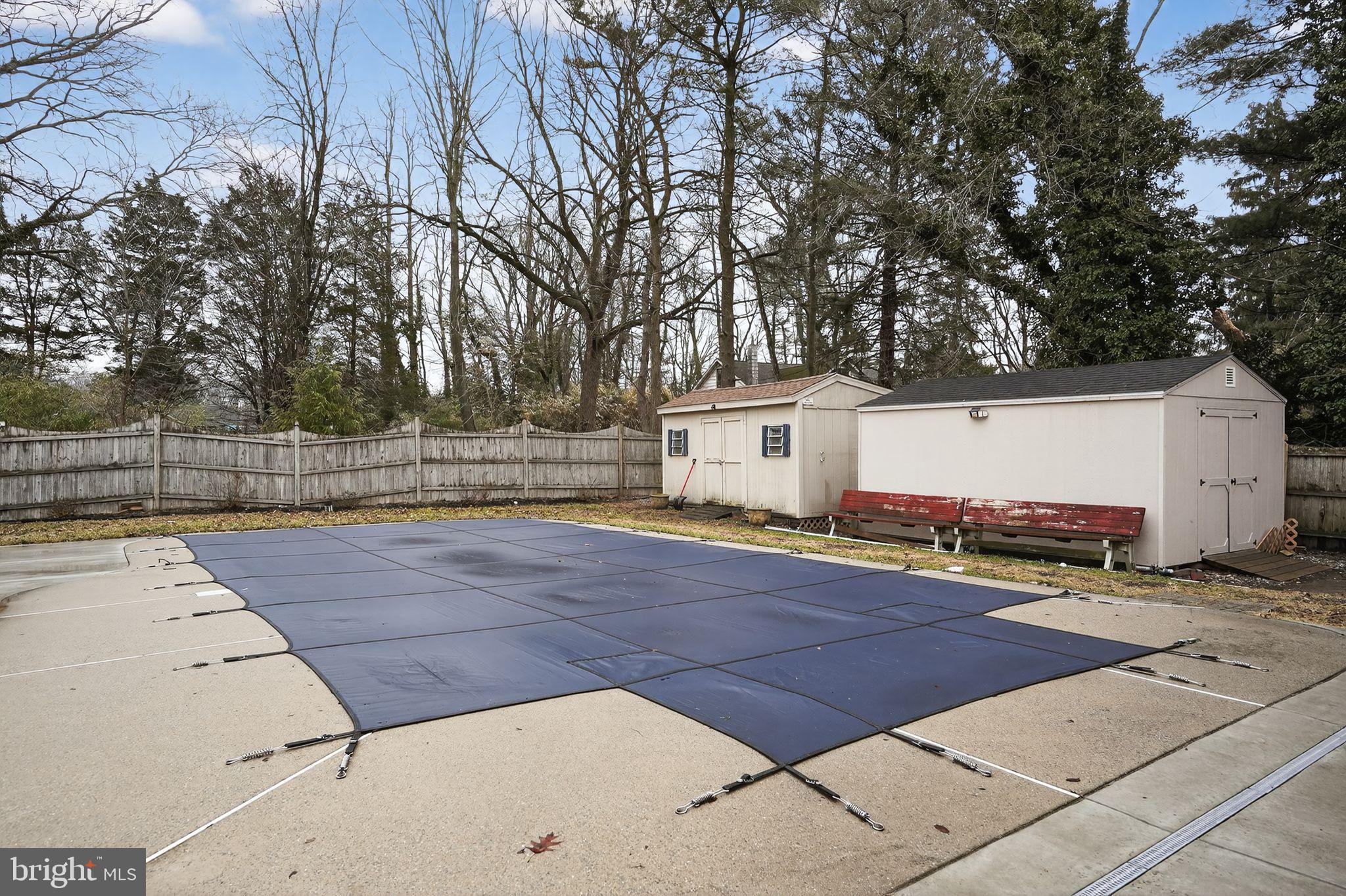 740 Carpenter Street Glassboro, NJ 08028 - Photo 39 of 44 Serene backyard retreat with pool cover.