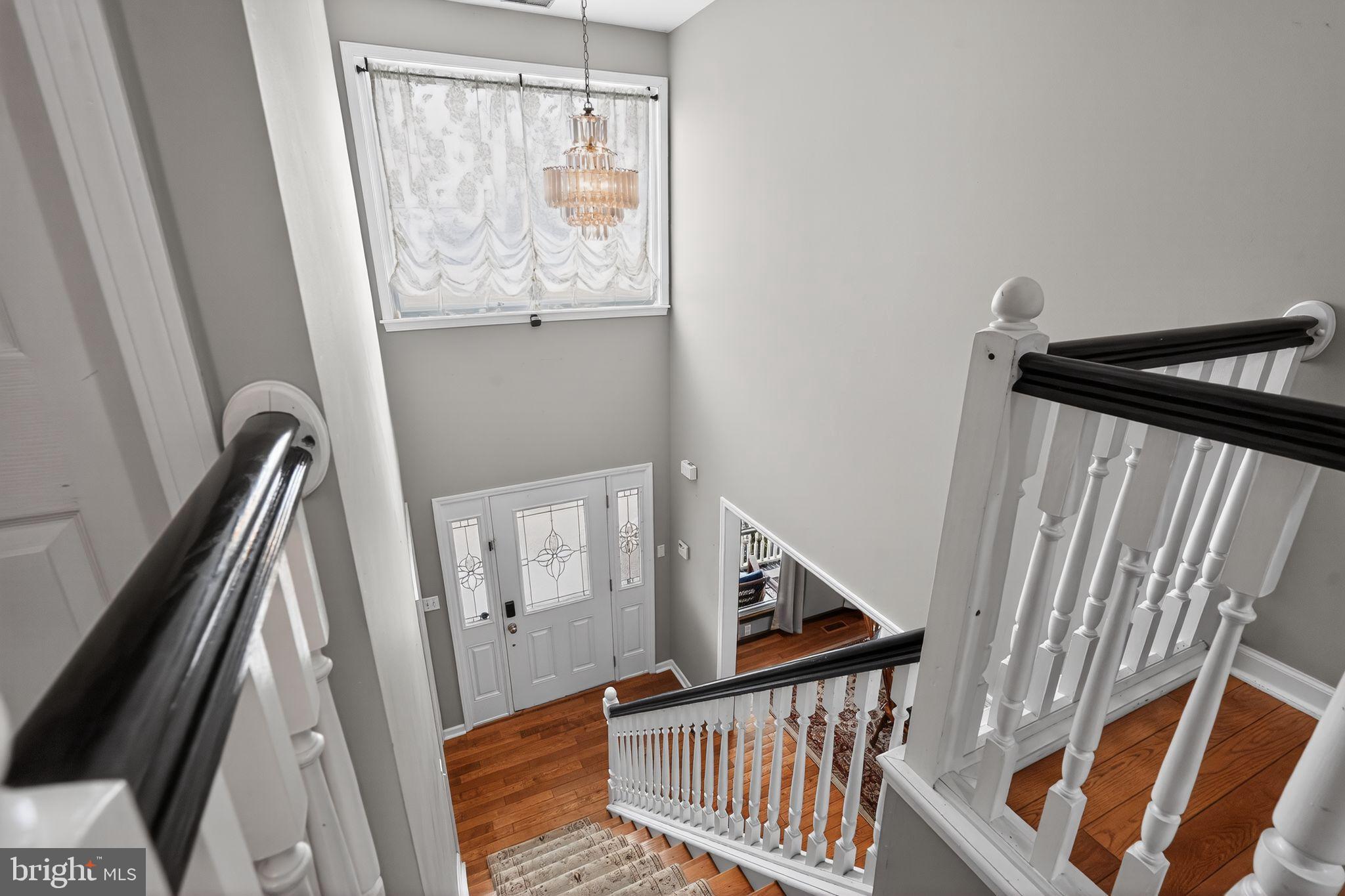 740 Carpenter Street Glassboro, NJ 08028 - Photo 5 of 44 Elegant staircase with natural light.