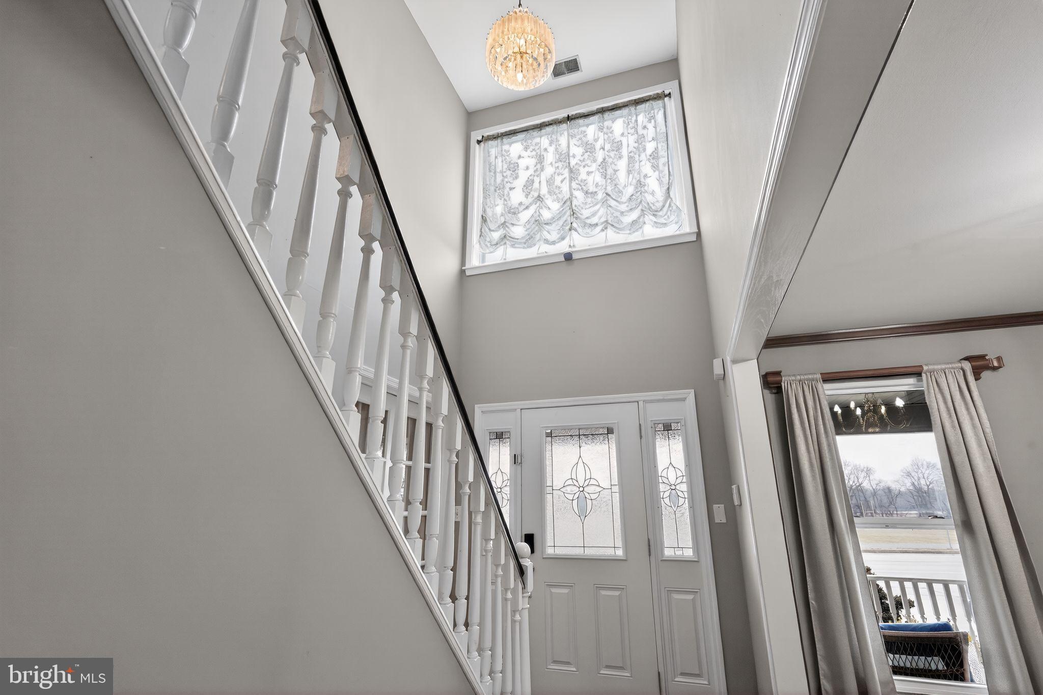 740 Carpenter Street Glassboro, NJ 08028 - Photo 6 of 44 Inviting entryway with elegant staircase.