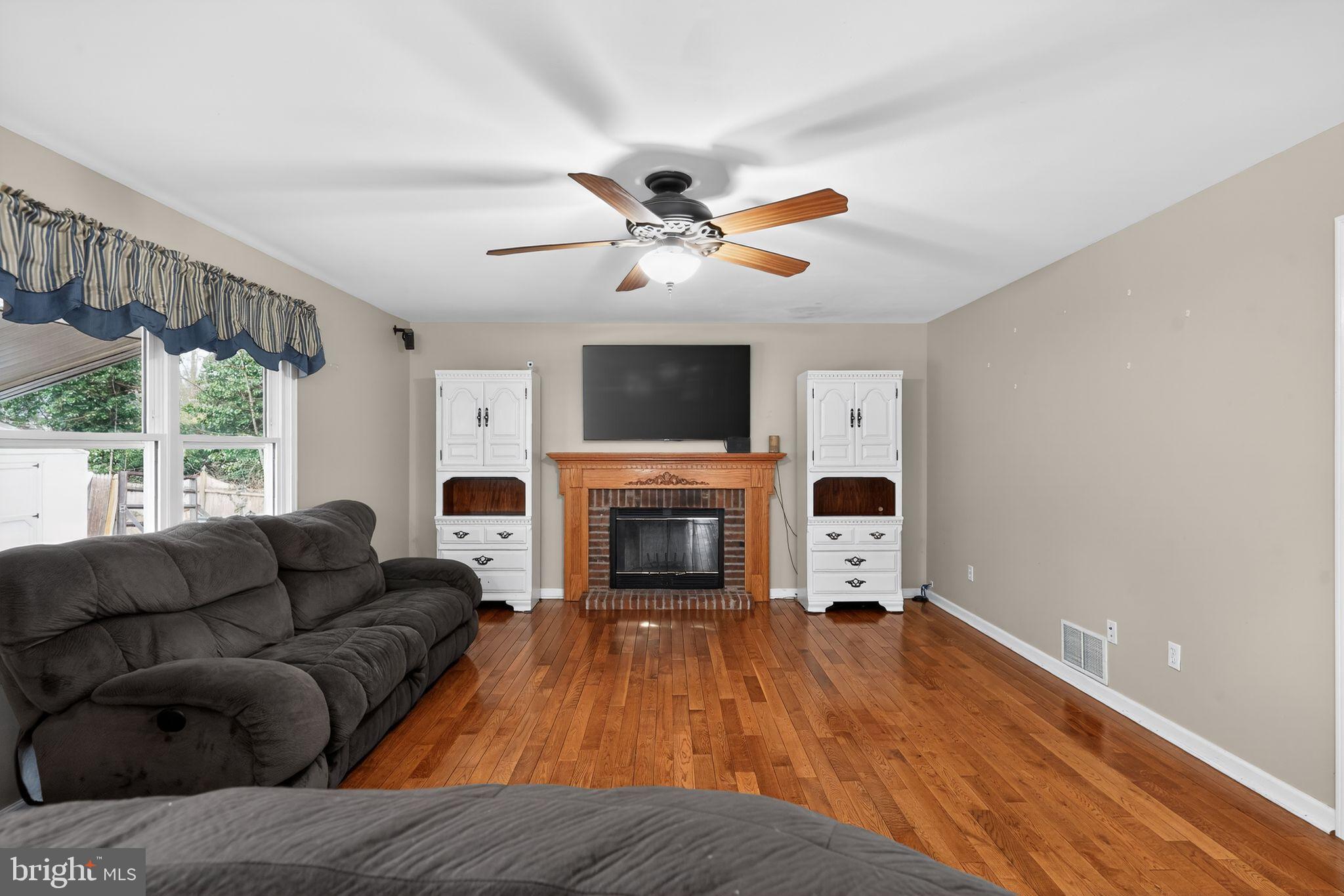 740 Carpenter Street Glassboro, NJ 08028 - Photo 9 of 44 Cozy living space with warm wood accents.