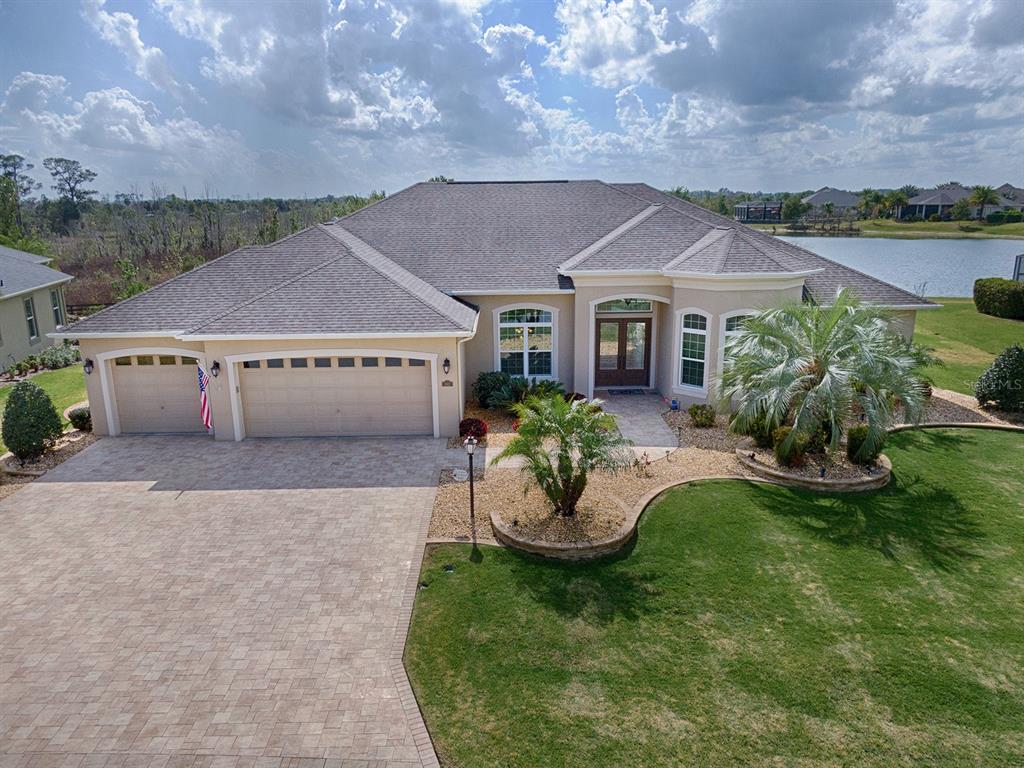 GORGEOUS 4/3 GRANDVIEW PREMIER WITH 3 CAR GARAGE IN THE VILLAGE OF OSCEOLA HILLS AT SOARING EAGLE!  WATER VIEW!!