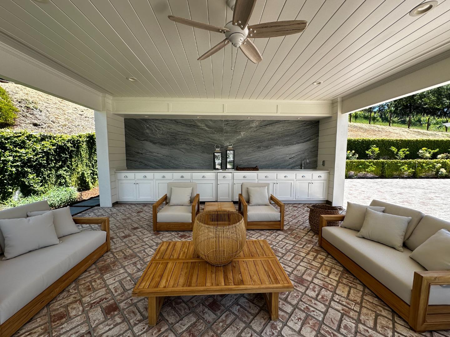 1075 Godetia Drive Woodside, CA 94062 - Photo 22 of 33 a living room with furniture and a large window