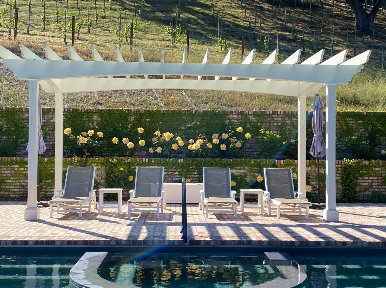 1075 Godetia Drive Woodside, CA 94062 - Photo 25 of 33 a view of a patio with a table and chairs